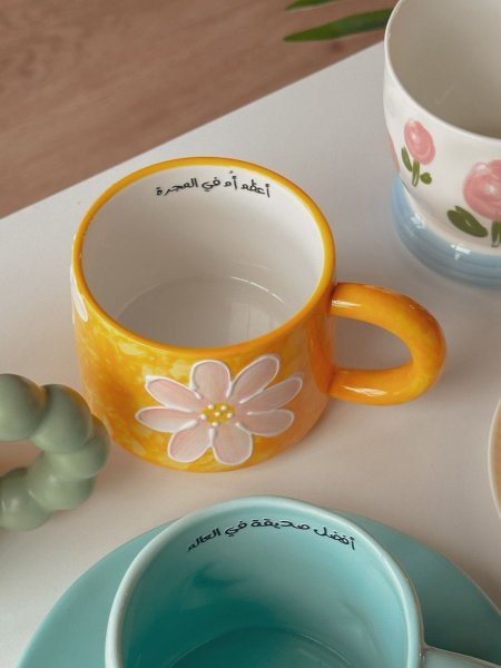 كوب مميز بعبارة "أعظم أم في المجرة"