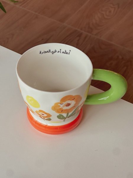 كوب مميز بعبارة "أعظم أم في المجرة"
