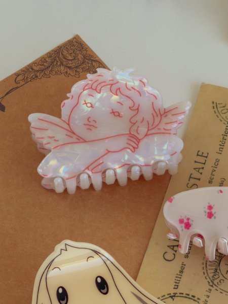 مشبك شعر شكل ملاك الحب (كييوبيد)