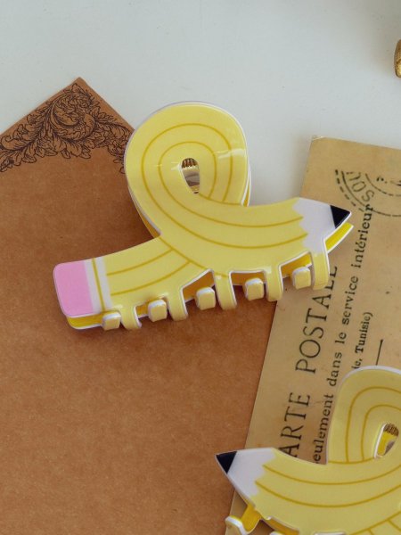 مشبك شعر شكل قلم