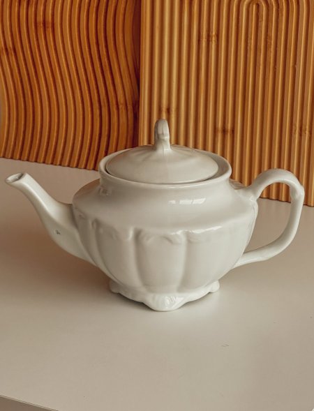 بريق شاي بورسلان لون أبيض